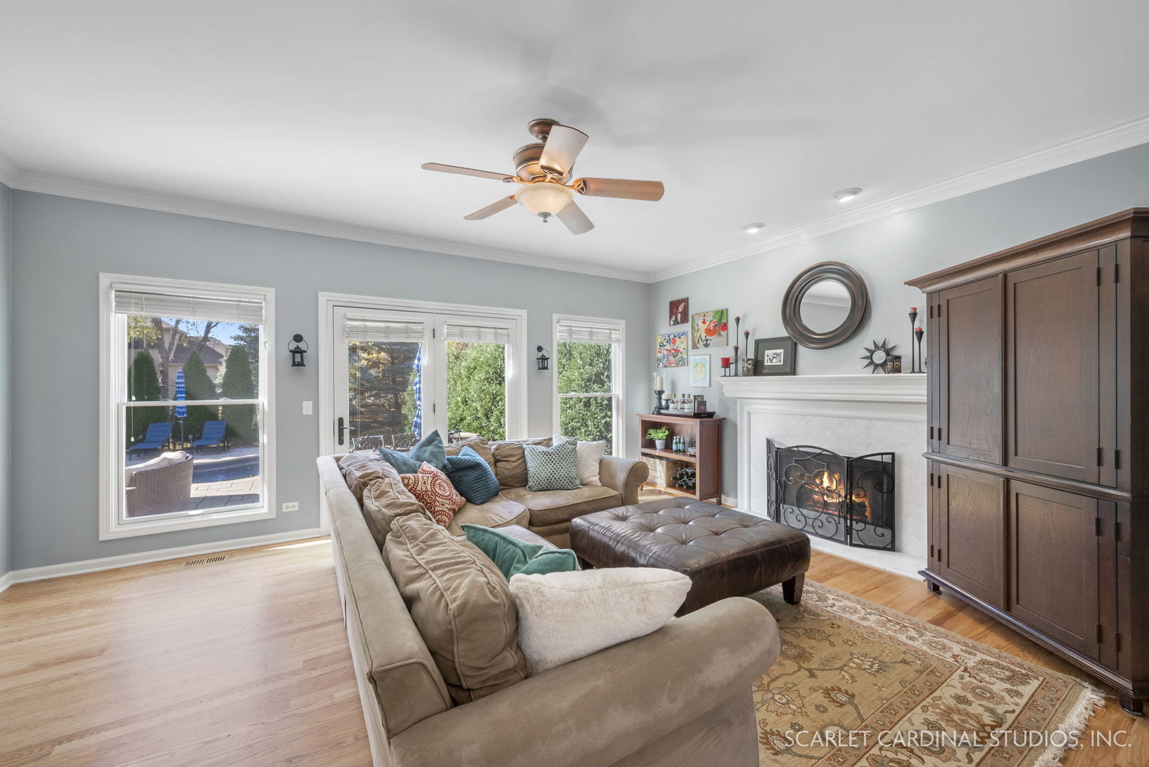 4860 Snapjack Circle Naperville, IL 60564 - Photo 6 of 35 a living room with furniture and a fireplace