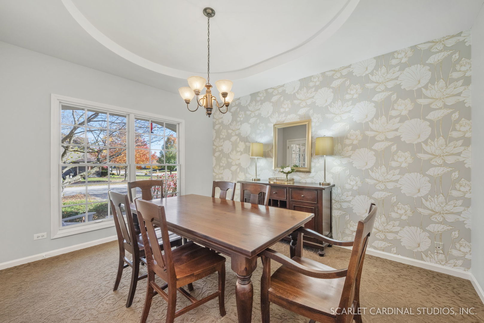 4860 Snapjack Circle Naperville, IL 60564 - Photo 8 of 35 a view of a dining room with furniture a chandelier and wooden floor