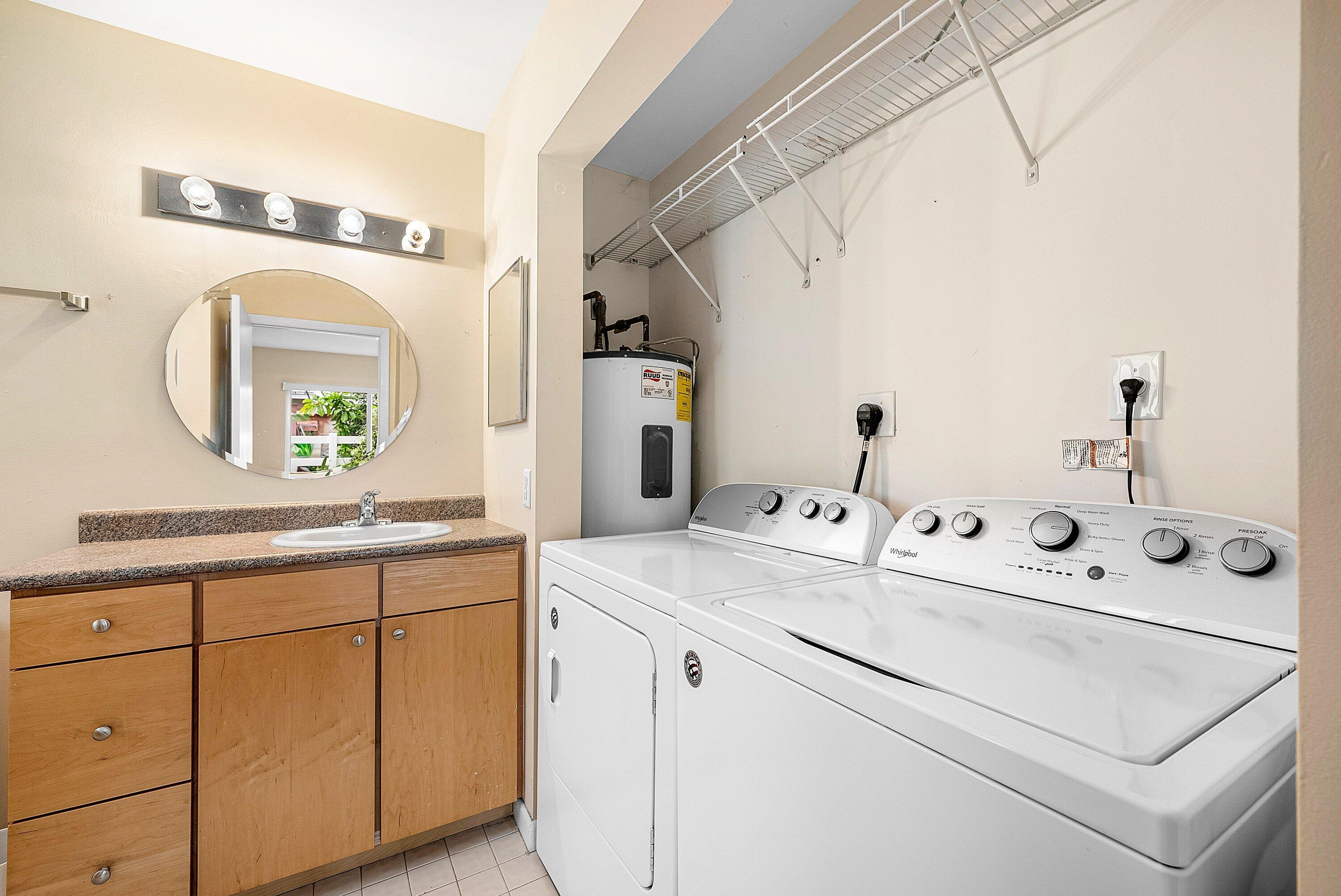 165 Northwest 8th Street Boca Raton, FL 33432 - Photo 23 of 42 a utility room with dryer and washer