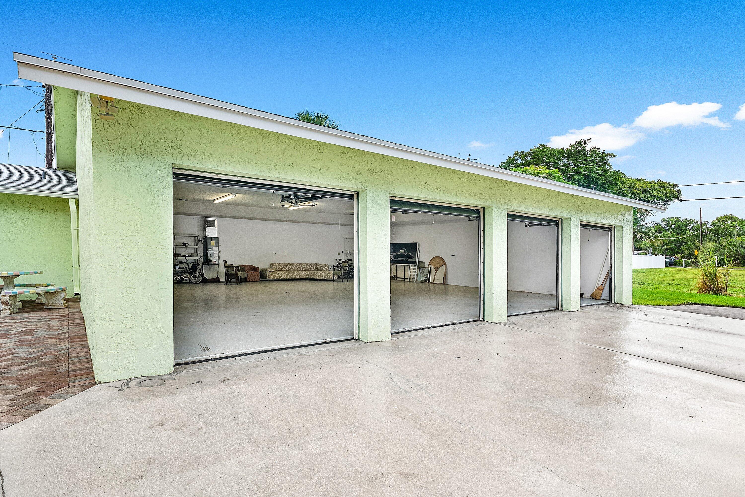165 Northwest 8th Street Boca Raton, FL 33432 - Photo 26 of 42 a view of a house with a outdoor space