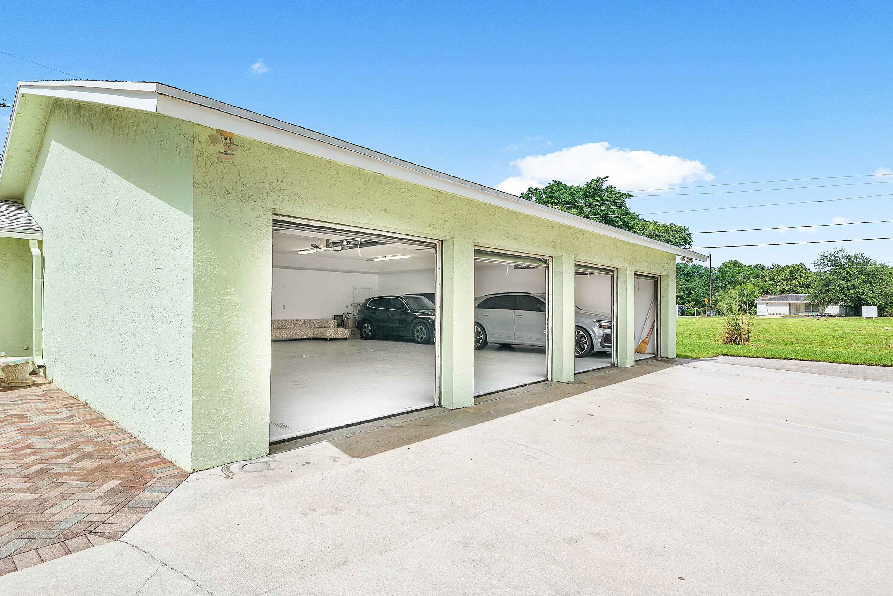 165 Northwest 8th Street Boca Raton, FL 33432 - Photo 27 of 42 a view of a house with a porch