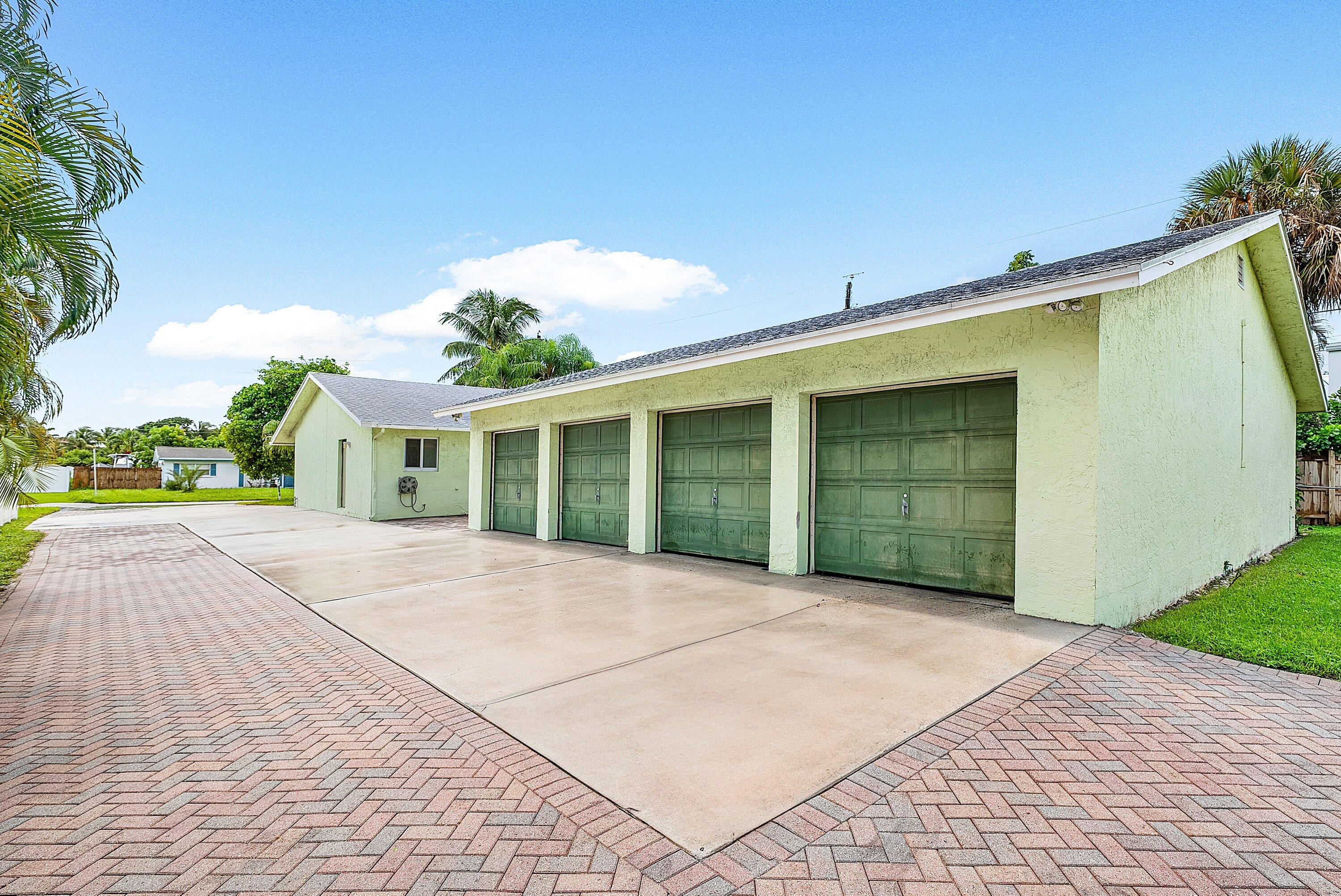 165 Northwest 8th Street Boca Raton, FL 33432 - Photo 30 of 42 a front view of house with yard