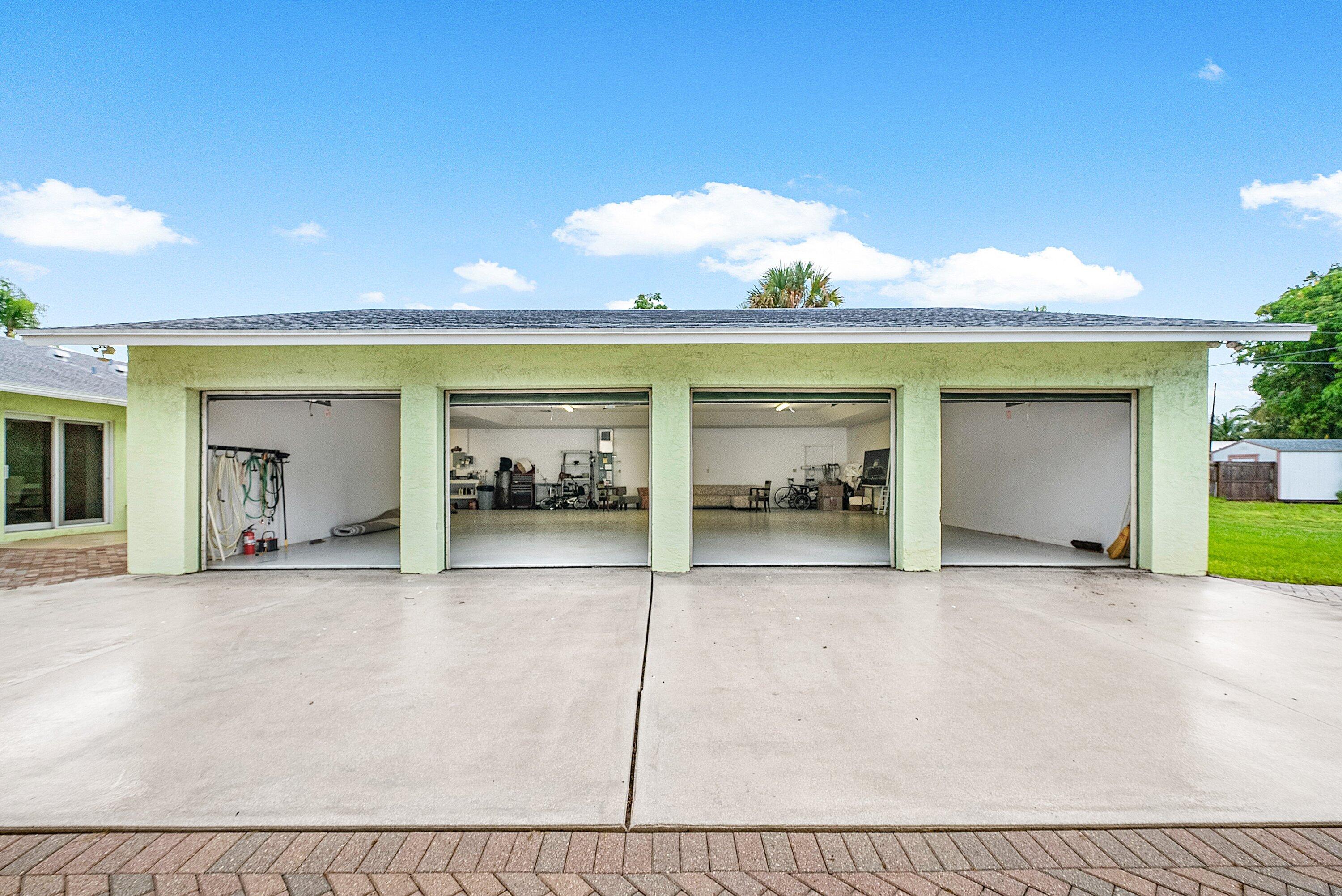 165 Northwest 8th Street Boca Raton, FL 33432 - Photo 3 of 42 a view of a house with a outdoor space