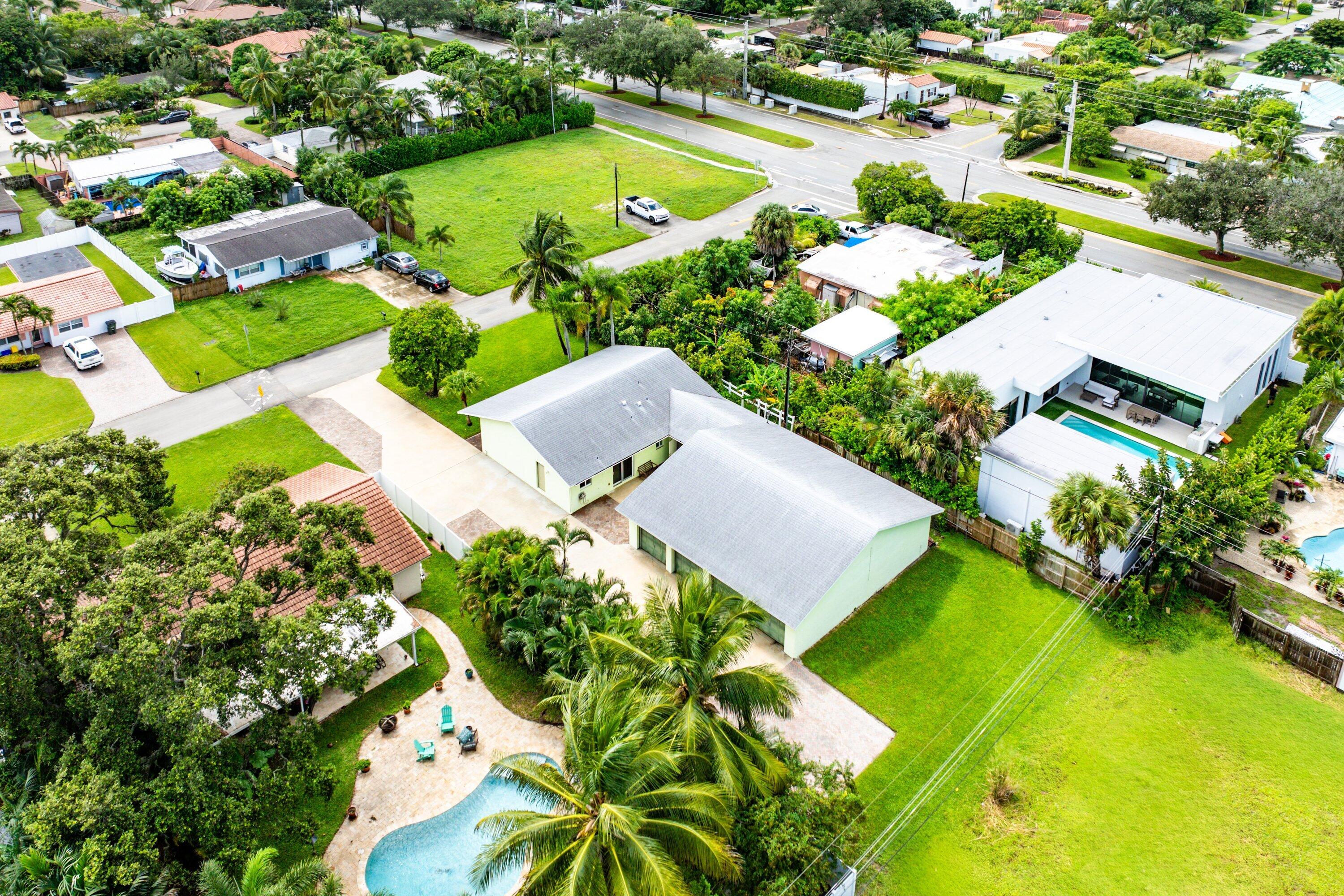 165 Northwest 8th Street Boca Raton, FL 33432 - Photo 38 of 42 an aerial view of residential houses with yard