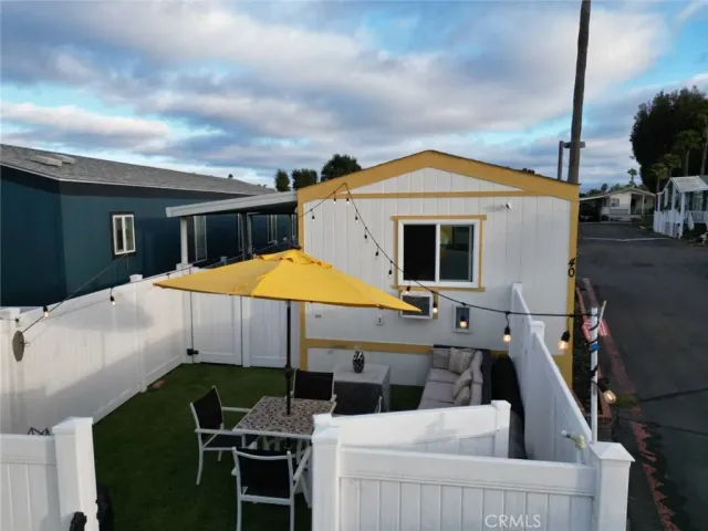 a front view of house with yard and patio