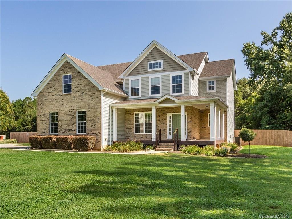708 Baucom Road Monroe, NC 28110 - Photo 1 of 33 a front view of house with yard and green space