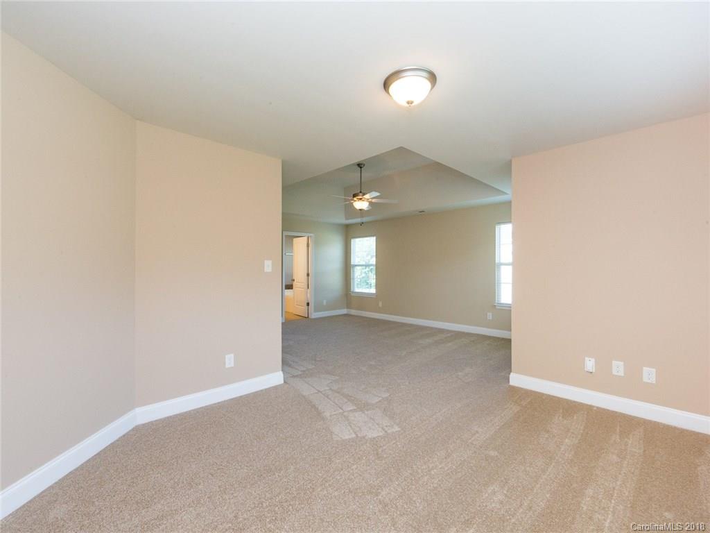 708 Baucom Road Monroe, NC 28110 - Photo 19 of 33 an empty room with a empty space and window