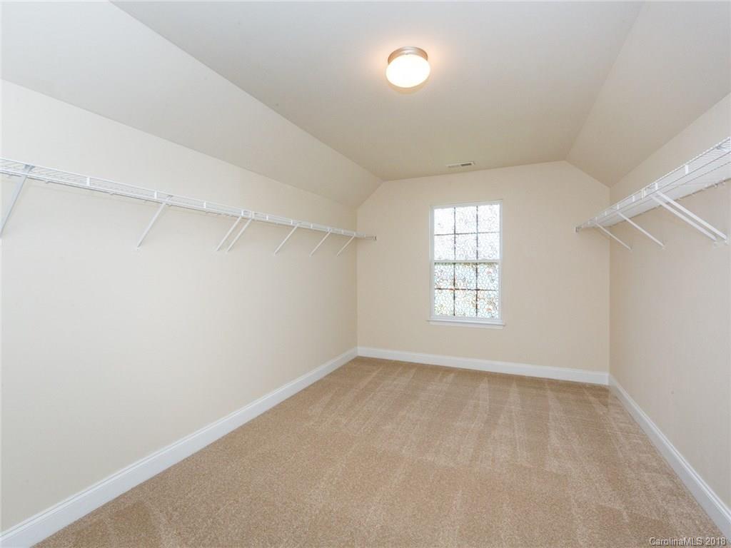 708 Baucom Road Monroe, NC 28110 - Photo 22 of 33 an empty room with a window