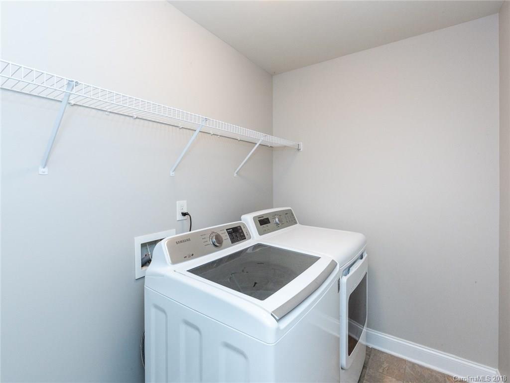 708 Baucom Road Monroe, NC 28110 - Photo 27 of 33 a utility room with dryer and washer