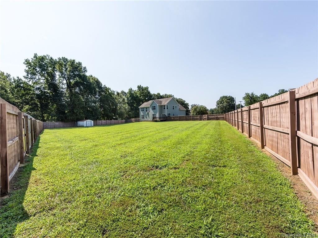 708 Baucom Road Monroe, NC 28110 - Photo 30 of 33 a view of a garden with a small yard