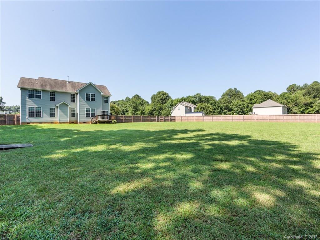 708 Baucom Road Monroe, NC 28110 - Photo 31 of 33 a view of a big house with a big yard