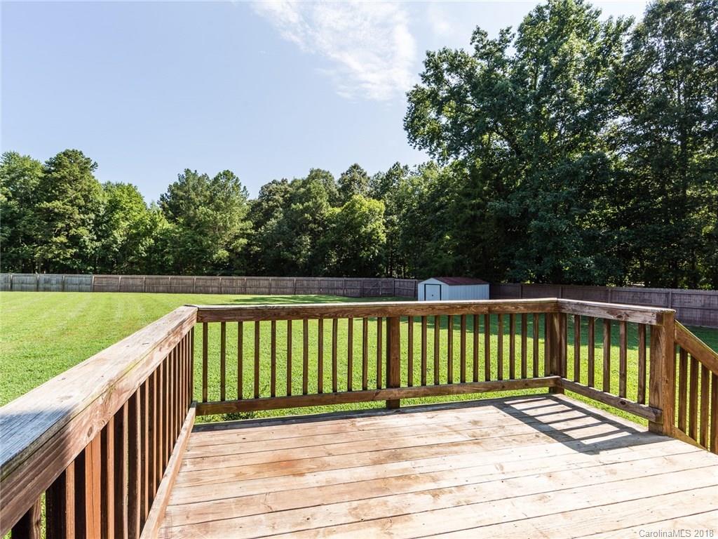 708 Baucom Road Monroe, NC 28110 - Photo 33 of 33 a view of deck with white fence and floor
