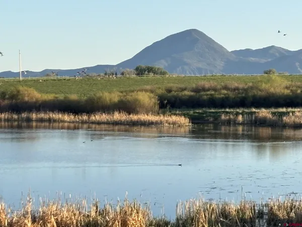 a view of lake with mountain