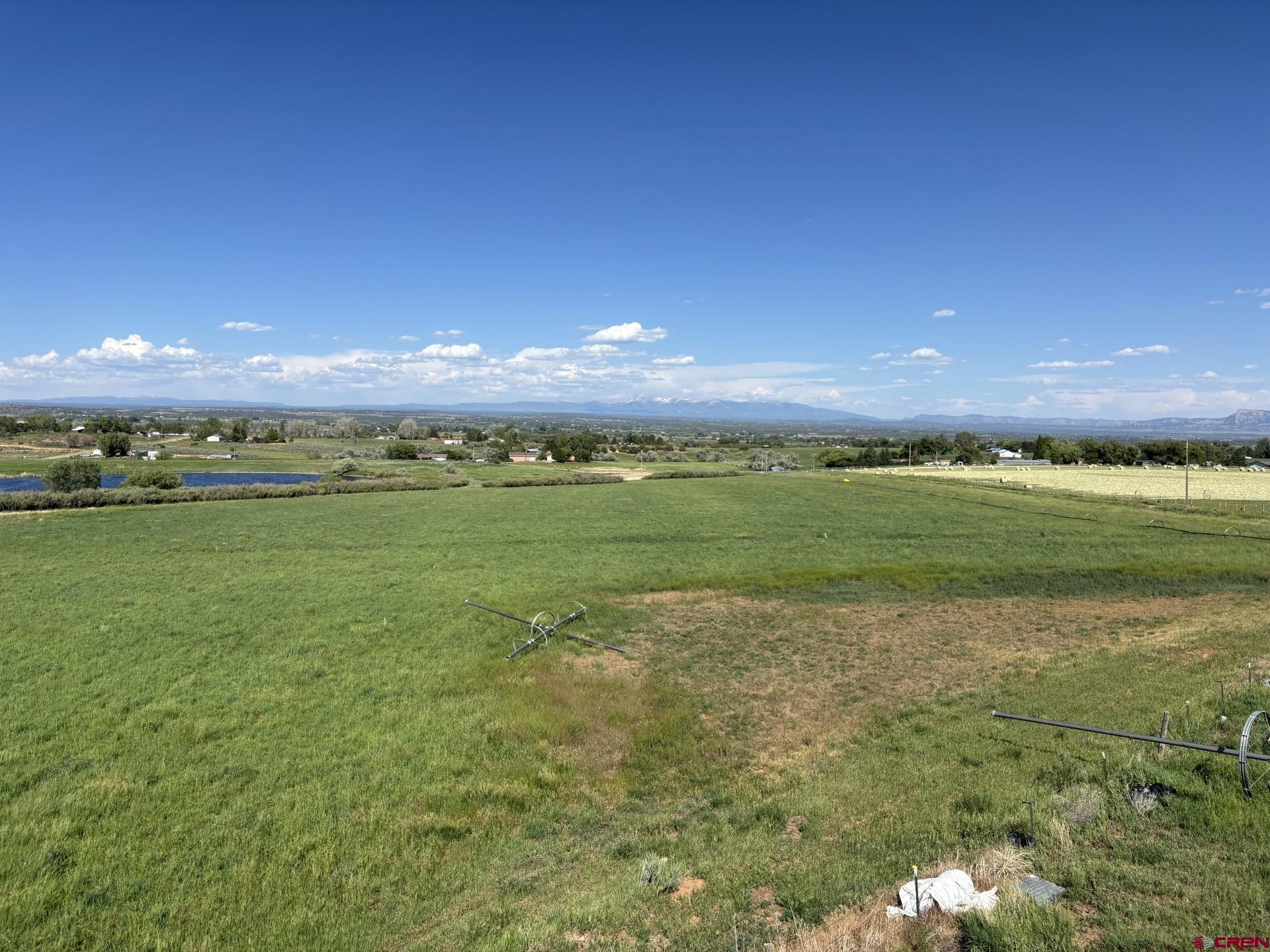 16513 Road 20 Cortez, CO 81321 - Photo 15 of 20 a view of a golf course with a lake