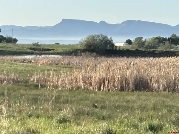 a view of lake with mountain
