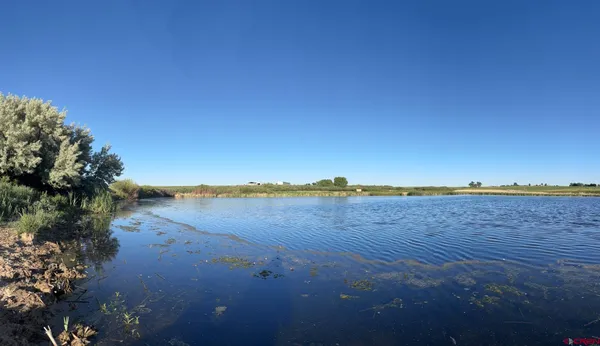 a view of lake and mountain