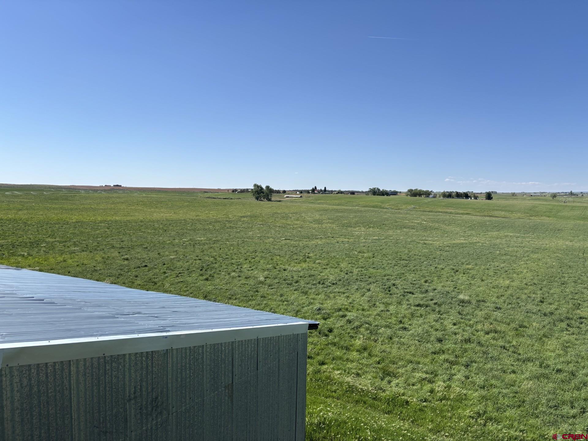16513 Road 20 Cortez, CO 81321 - Photo 10 of 20 a view of a field with an ocean