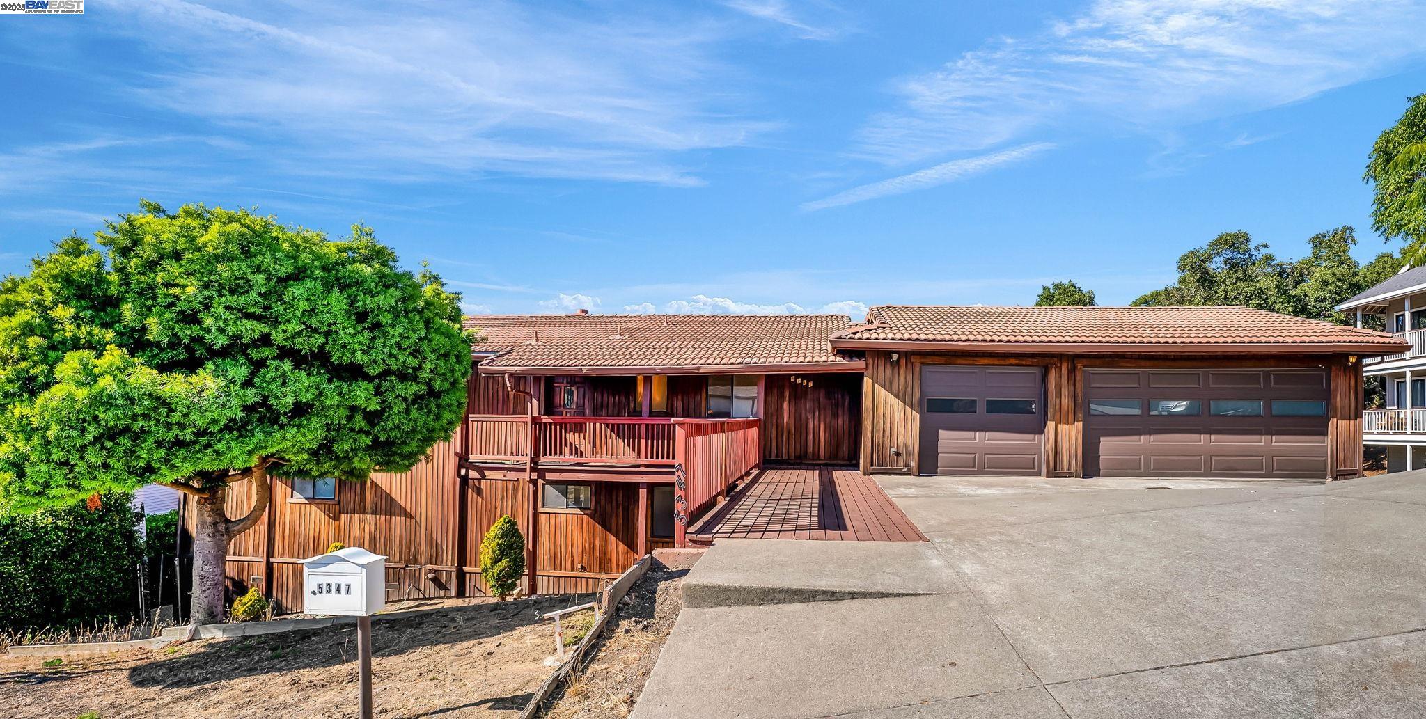 5347 Heavenly Ridge Lane Richmond, CA 94803 - Photo 1 of 1 a front view of a house with a yard