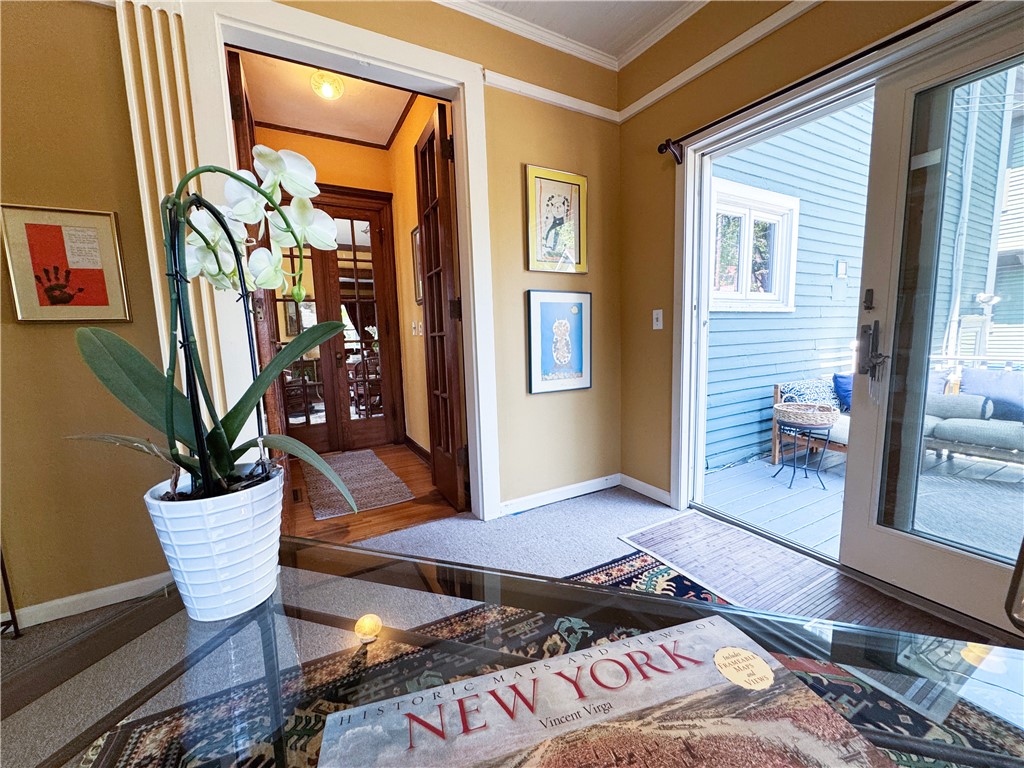 106 Argyle Street Rochester, NY 14607 - Photo 20 of 50 Sliding door leads you to the private deck.
