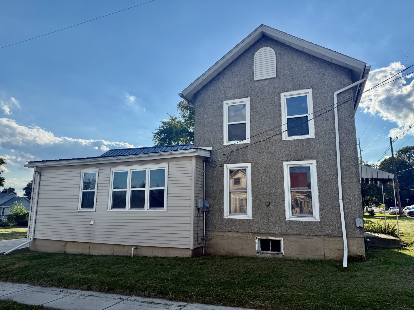 2302 1st Street Peru, IL 61354 - Photo 16 of 22 a front view of a house with a yard