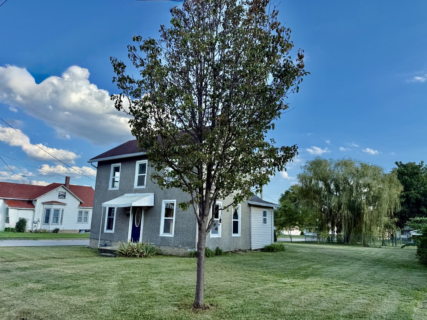 2302 1st Street Peru, IL 61354 - Photo 18 of 22 a front view of house with yard and green space