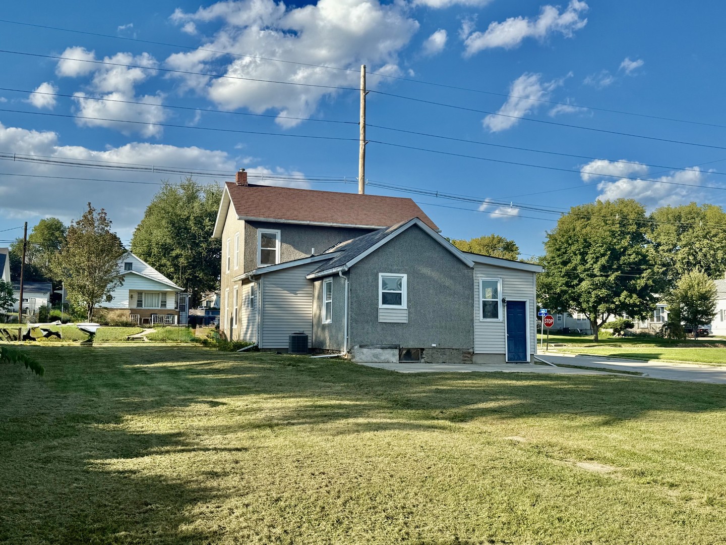 2302 1st Street Peru, IL 61354 - Photo 22 of 22 a view of a house with a big yard and palm trees