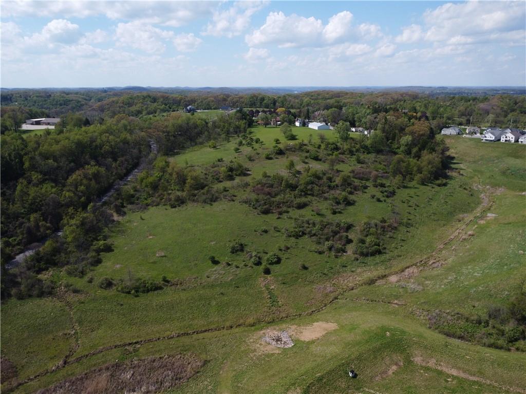 5692 North Montour Road Gibsonia, PA 15044 - Photo 1 of 6 an aerial view of a houses with a yard