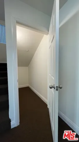 a view of hallway with stairs