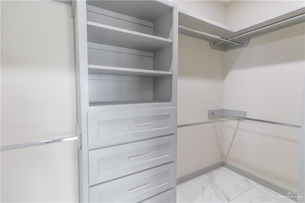 216 Nazareth Street Rio Grande City, TX 78582 - Photo 10 of 14 a view of walk in closet with empty racks