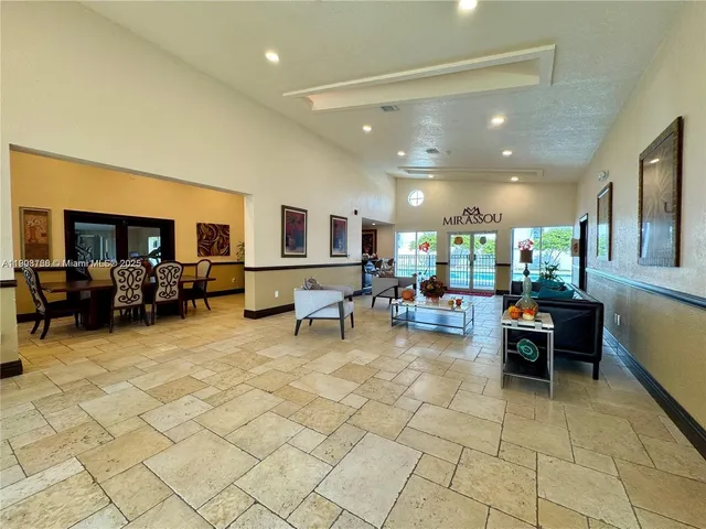a living room with furniture and a table