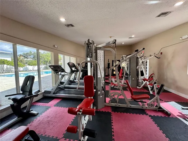 a view of a room with gym equipment