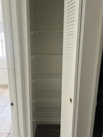 a bathroom with a glass door