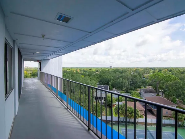 a balcony with an outdoor space