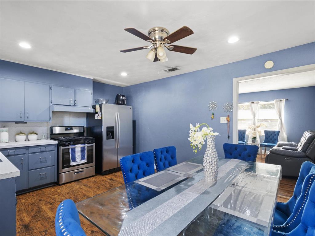 1805 Stevens Street Bridgeport, TX 76426 - Photo 11 of 24 a living room with stainless steel appliances furniture a chandelier and a view of kitchen