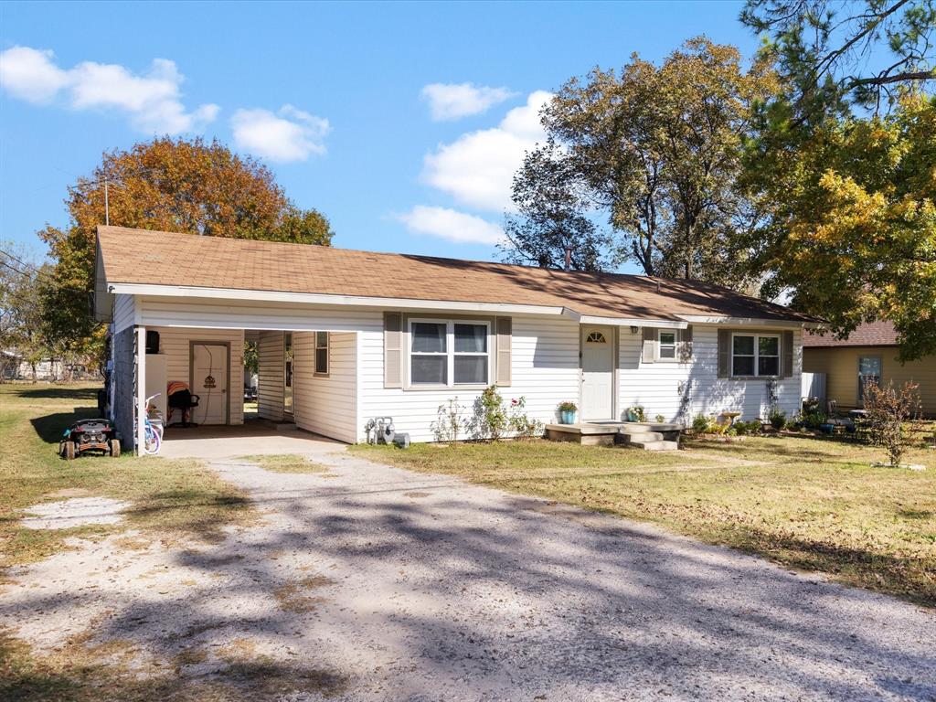 1805 Stevens Street Bridgeport, TX 76426 - Photo 2 of 24 a view of a house with a patio