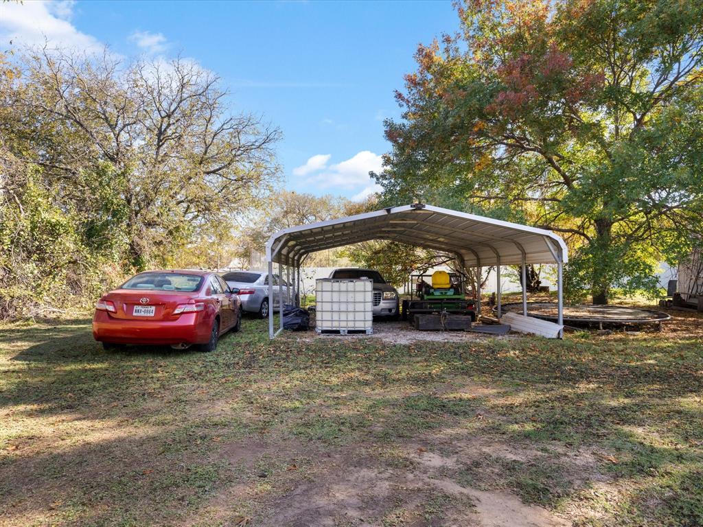 1805 Stevens Street Bridgeport, TX 76426 - Photo 24 of 24 a view of a car is parked in front of a house
