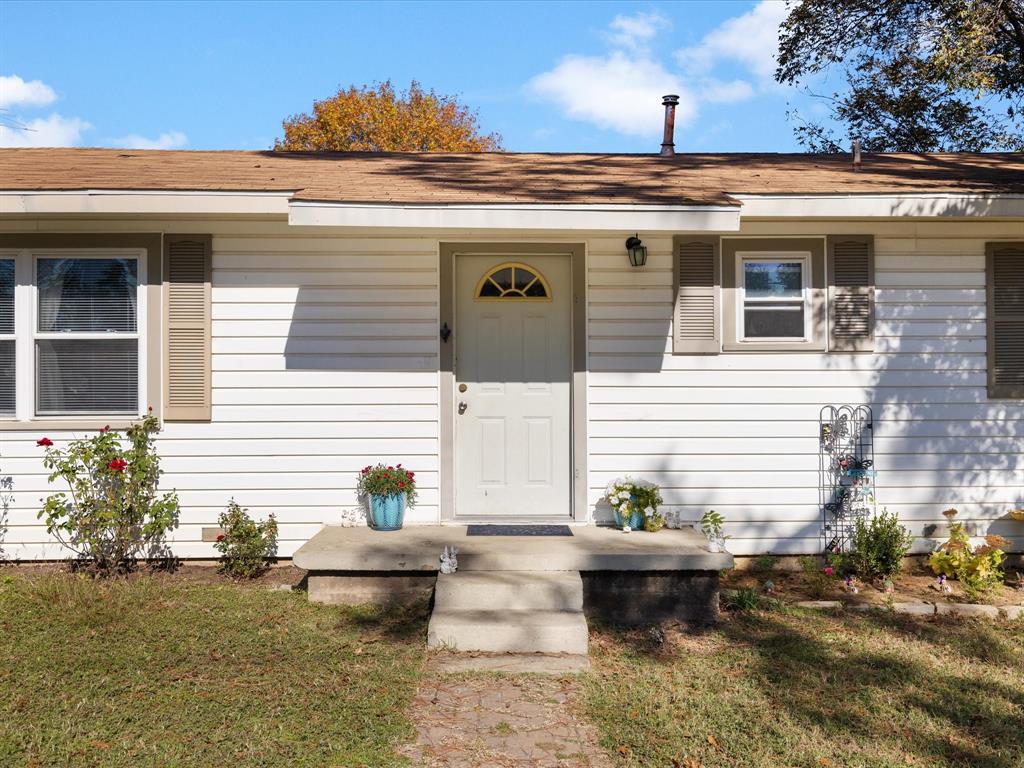1805 Stevens Street Bridgeport, TX 76426 - Photo 4 of 24 a view of a white house with a chairs in patio