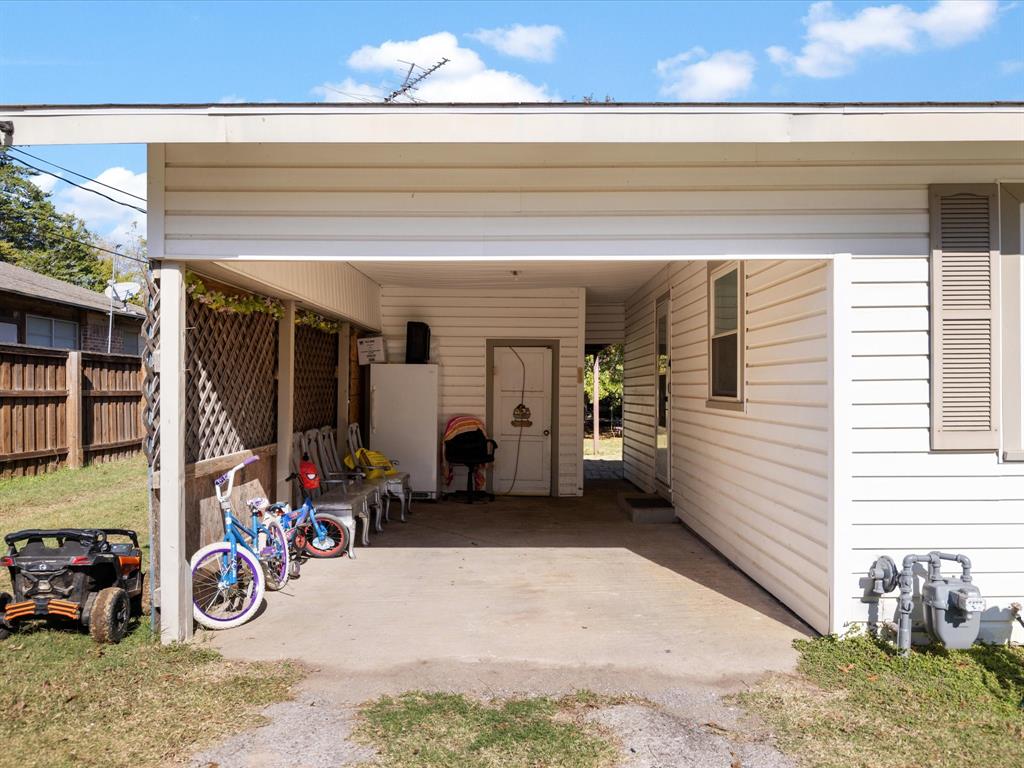 1805 Stevens Street Bridgeport, TX 76426 - Photo 5 of 24 a view of a garage with parked cars