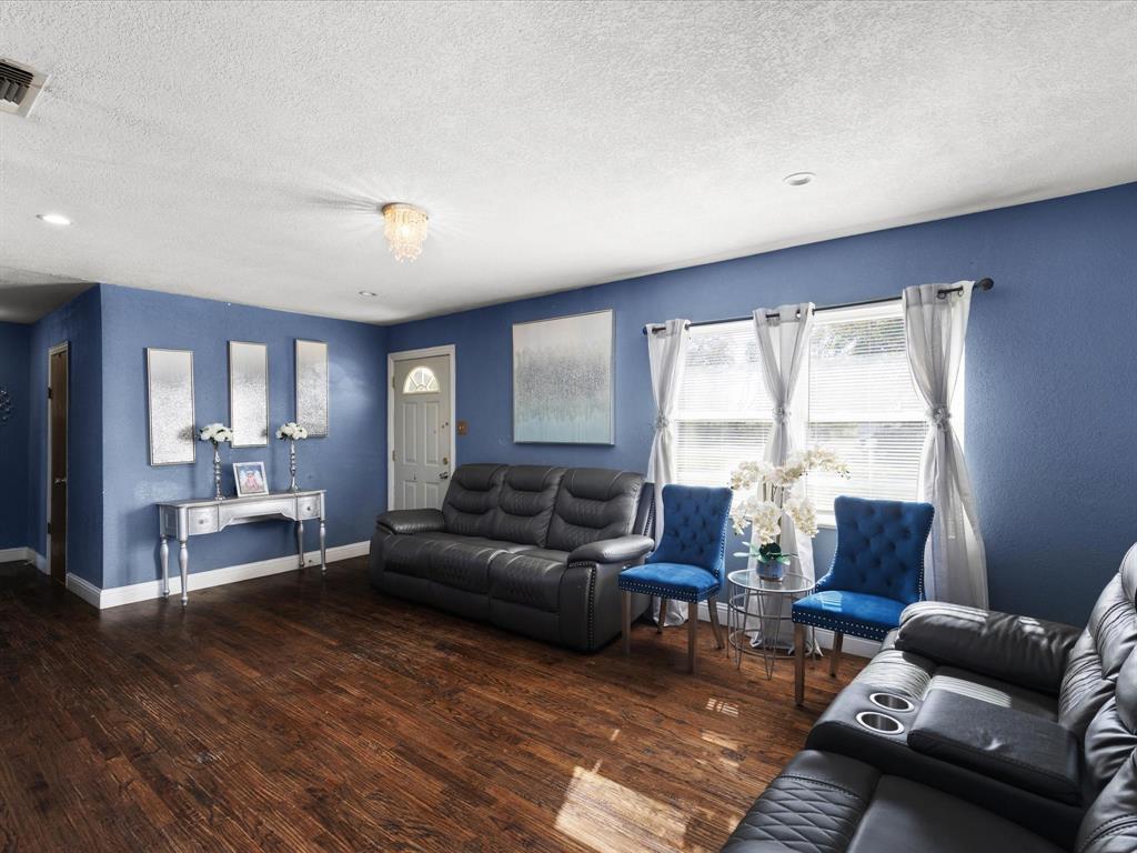 1805 Stevens Street Bridgeport, TX 76426 - Photo 8 of 24 a living room with furniture and a large window
