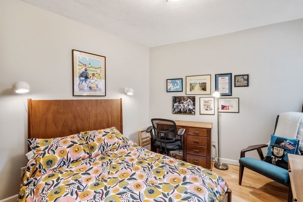 136 Prince Street, Unit 6 Boston, MA 02113 - Photo 11 of 14 a bedroom with a bed and furniture