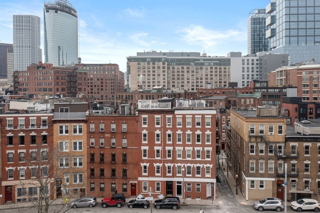 136 Prince Street, Unit 6 Boston, MA 02113 - Photo 12 of 14 a view of a city that has tall buildings