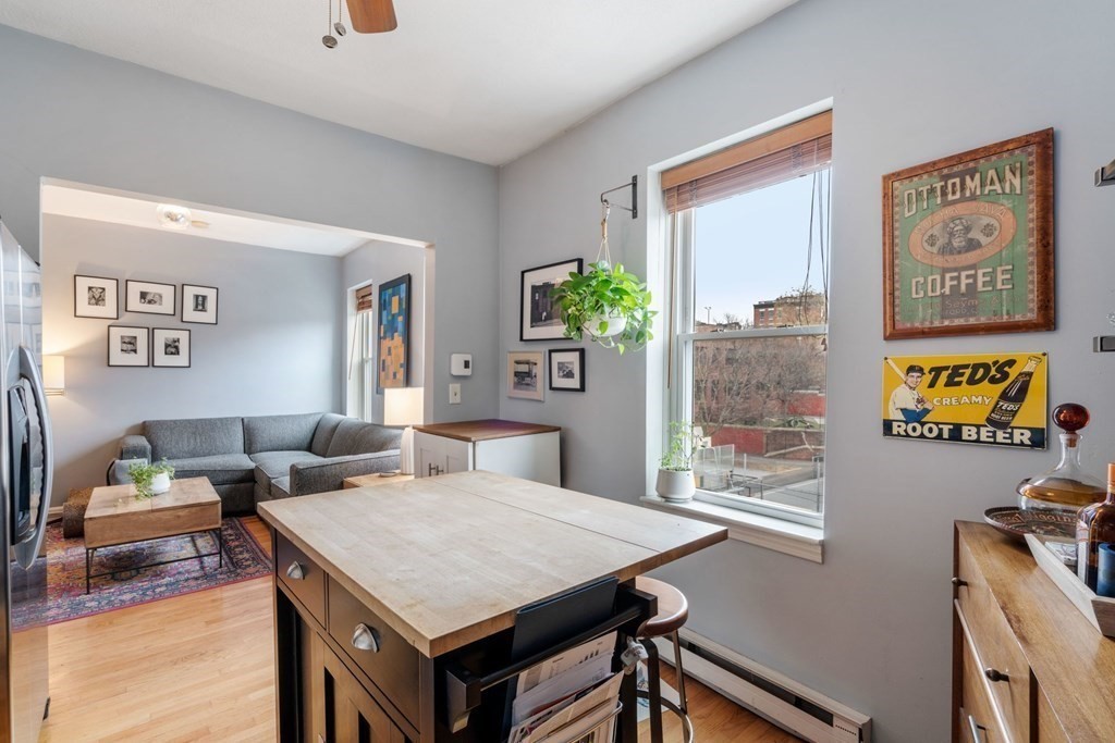 136 Prince Street, Unit 6 Boston, MA 02113 - Photo 2 of 14 a living room with furniture and a potted plant