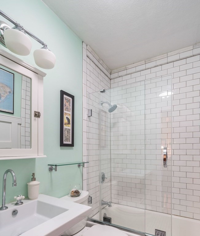 136 Prince Street, Unit 6 Boston, MA 02113 - Photo 8 of 14 a bathroom with a sink and a shower