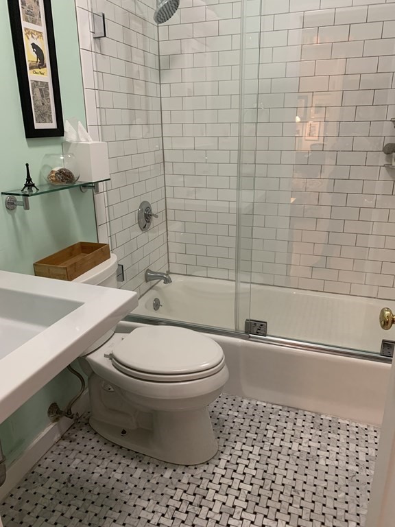 136 Prince Street, Unit 6 Boston, MA 02113 - Photo 9 of 14 a bathroom with a sink a toilet and shower