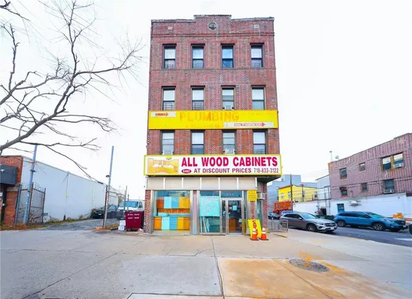 a view of a street with cars