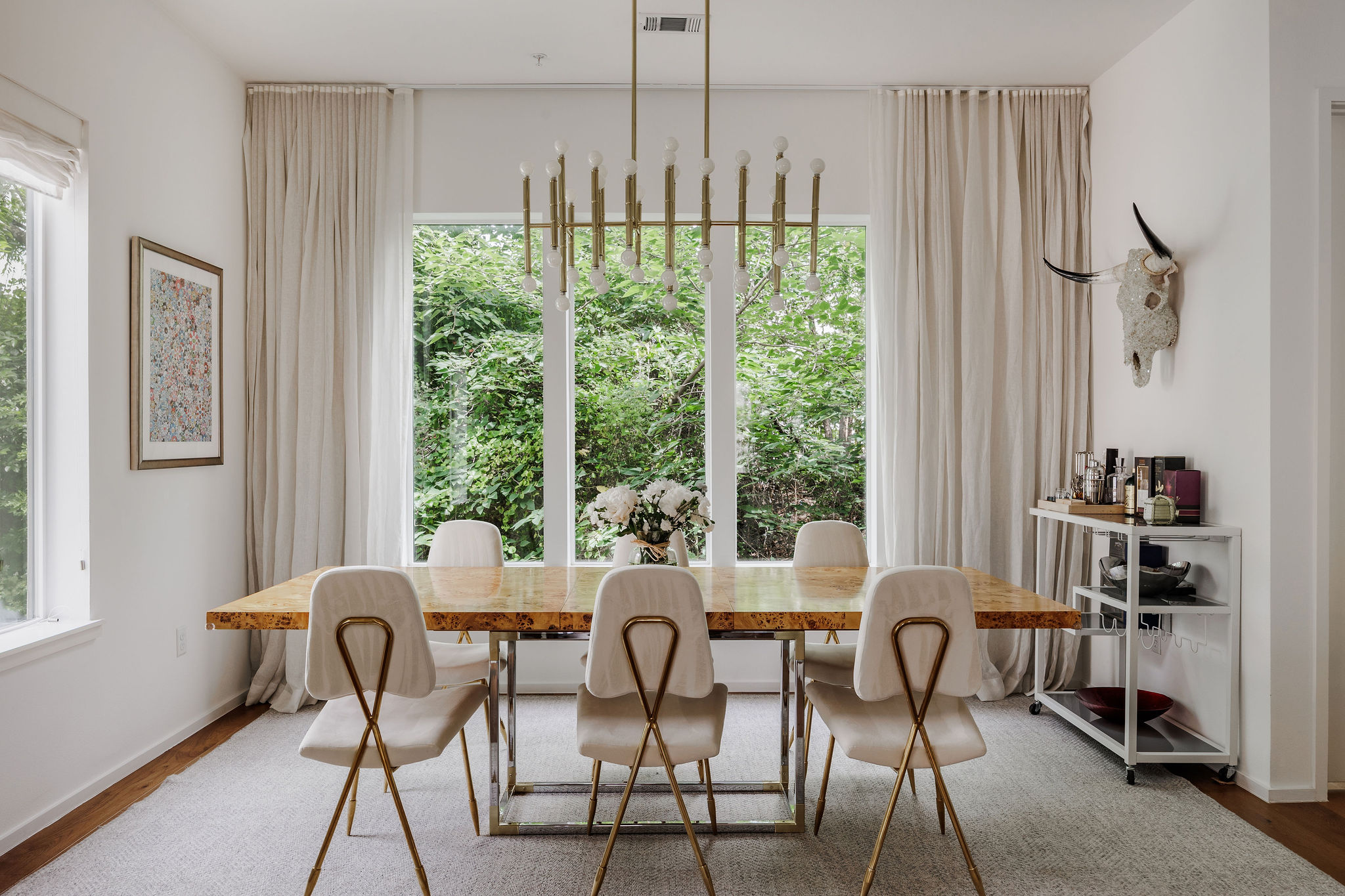 3100 Menchaca Road, Unit 11 Austin, TX 78704 - Photo 1 of 31 Enjoy casual dinners in a warm and inviting space, complete with the energy of the surrounding tree-filled view