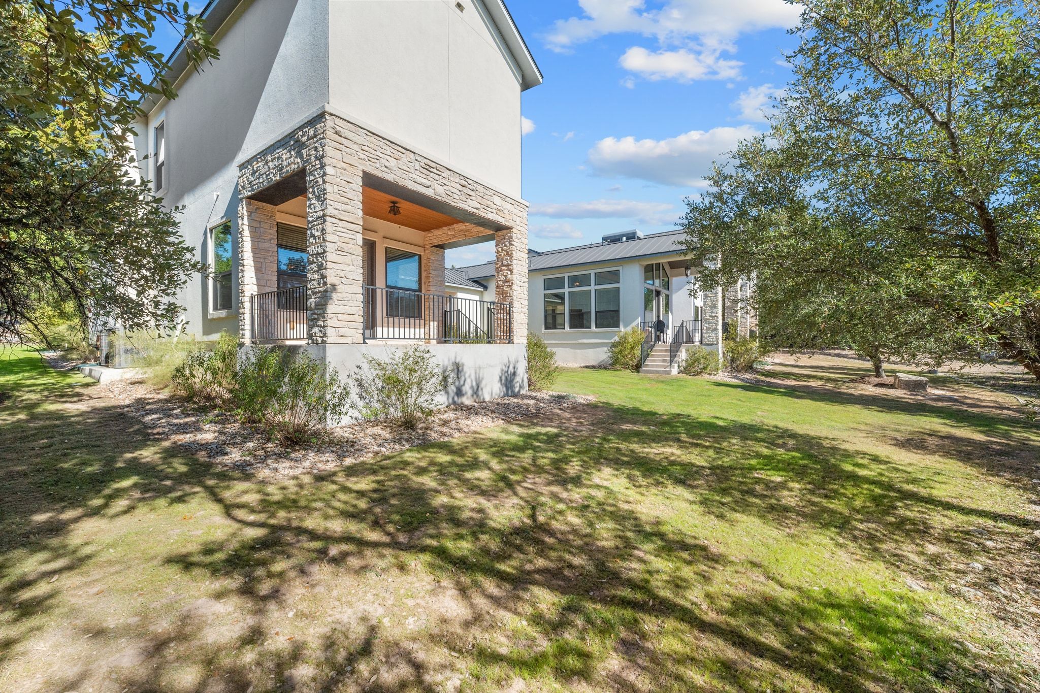20607 Thurman Bend Road Spicewood, TX 78669 - Photo 32 of 39 a front view of house with yard