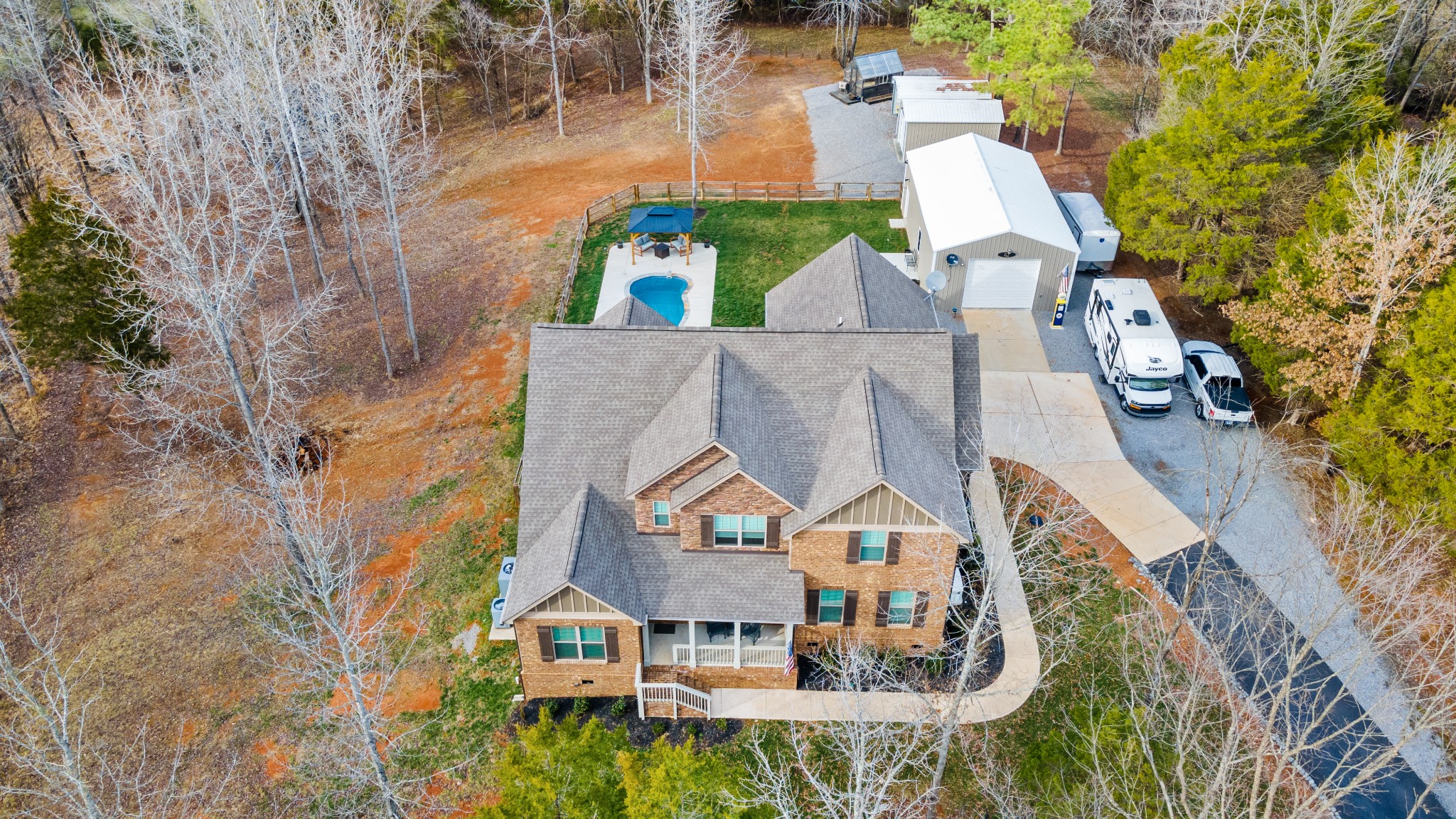 587 Flippen Road Lebanon, TN 37087 - Photo 1 of 40 an aerial view of a house with a big yard