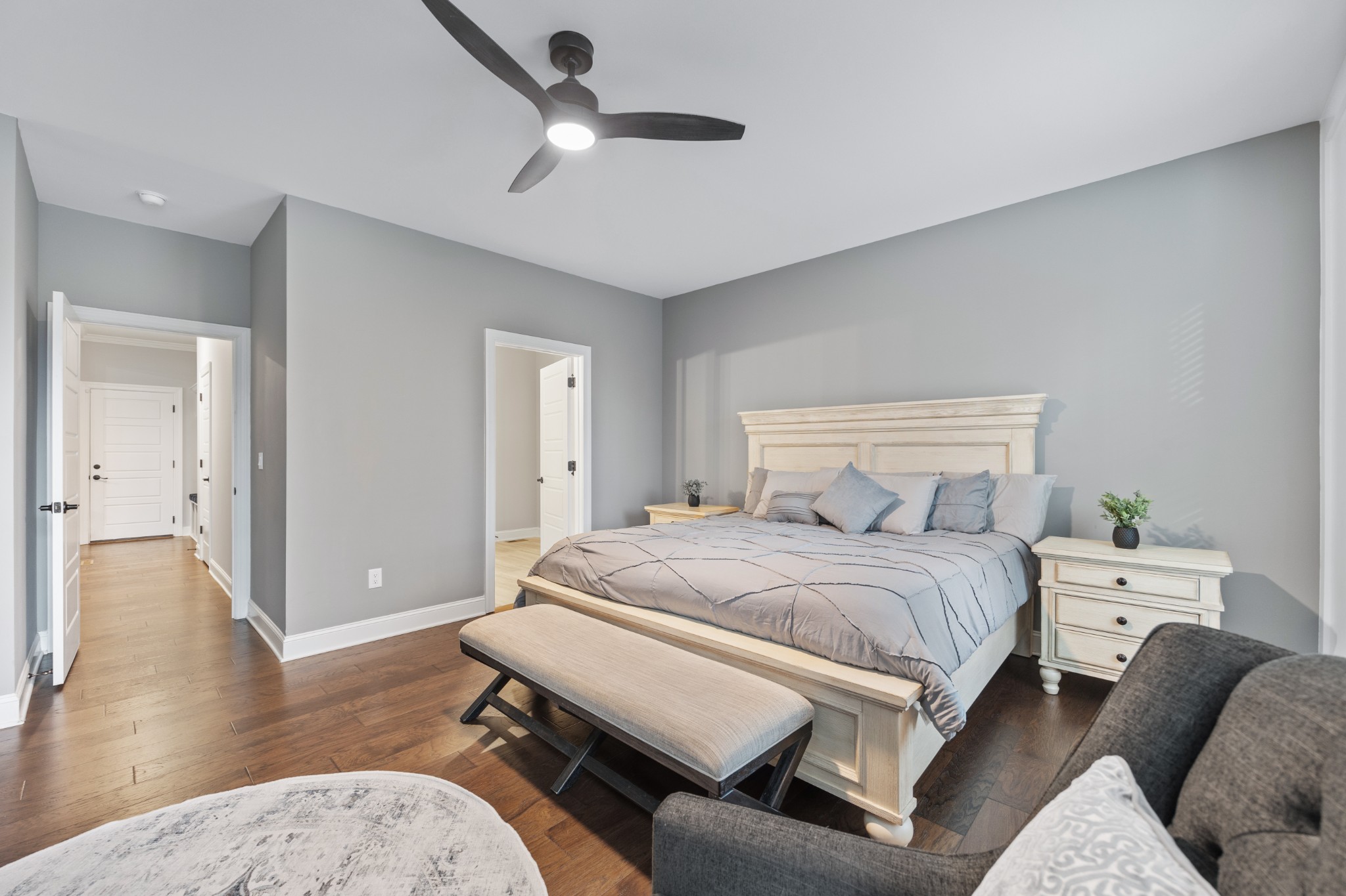 587 Flippen Road Lebanon, TN 37087 - Photo 18 of 40 a bedroom with a bed and a wooden floor
