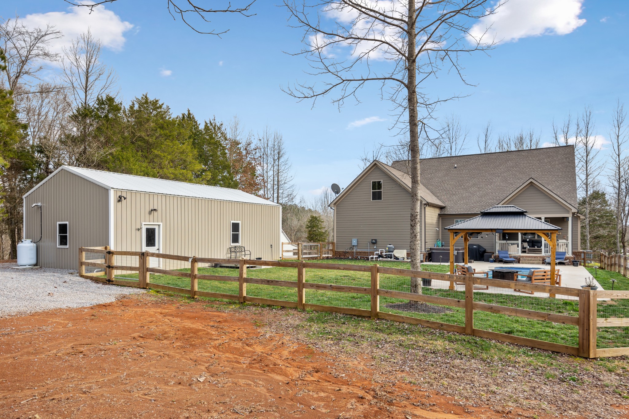 587 Flippen Road Lebanon, TN 37087 - Photo 9 of 40 a view of a house with backyard and sitting area
